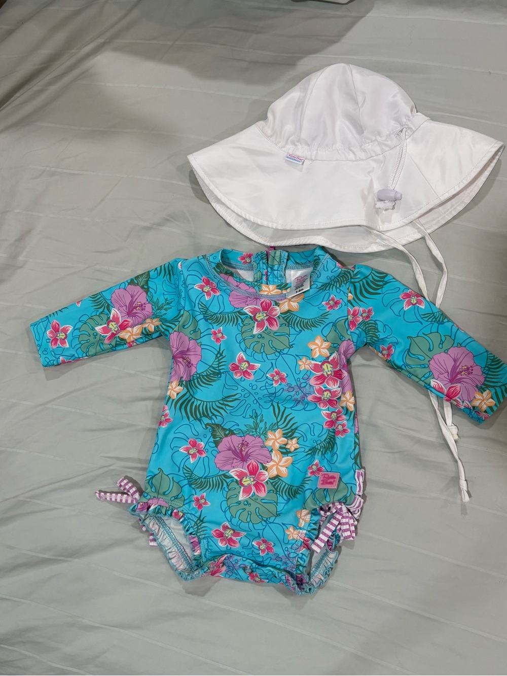 RuffleButts swimsuit with hat